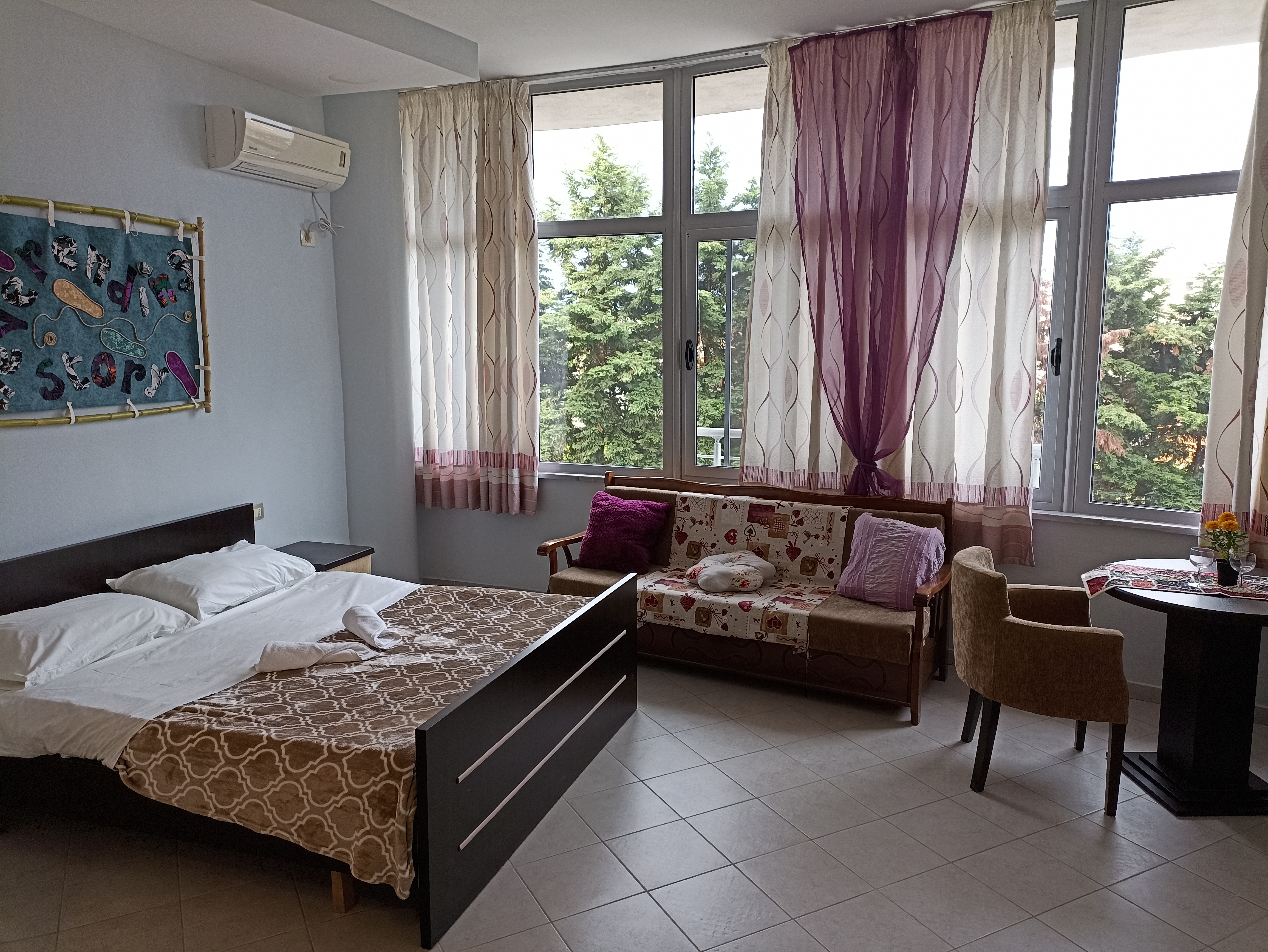 Water Violet Loft with masterbed, sofa table and chairs.